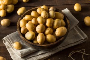 Potatoes in a bowl on a table