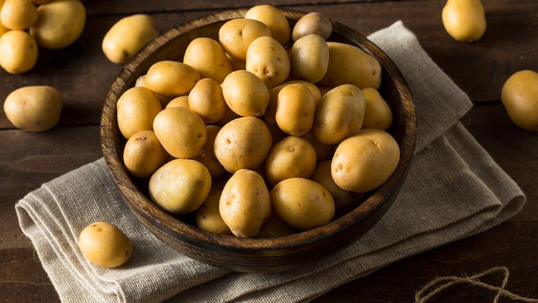 Potatoes in a bowl on a table
