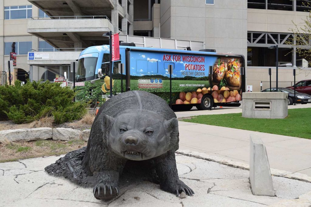 Badger statue with Spudmobile in background